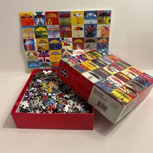 Re-Marks 1000 Piece Rainy Day Umbrella Jigsaw Puzzle 19.25" x 26.75"